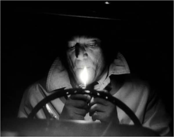 Eddie Constantine dans Alphaville de JL Godard in Voyage dans le cinéma français de Bertrand Tavernier Eddie Constantine dans Alphaville de JL Godard in Voyage dans le cinéma français de Bertrand Tavernier